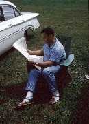 S0829 man reading newspaper